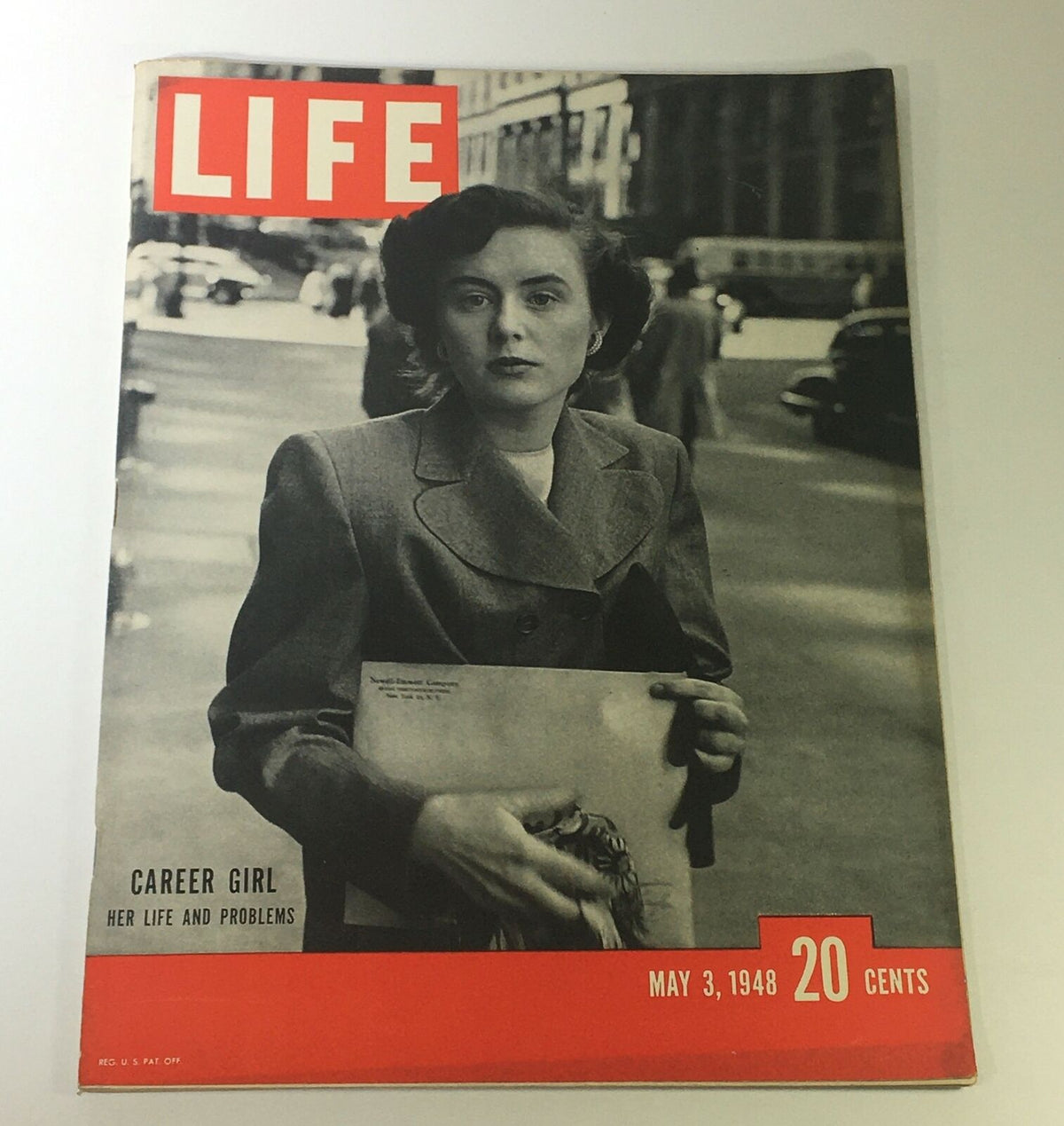 Vintage Life Magazine cover from May 3, 1948, titled 'Career Girl: Her Life & Problems,' featuring a woman in a tailored suit holding a document on a city street.