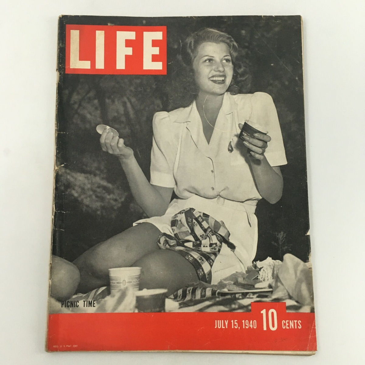 Vintage Life Magazine cover dated July 15, 1940, featuring Rita Hayworth in a 'Picnic Time' themed spread, showcasing retro Hollywood charm.