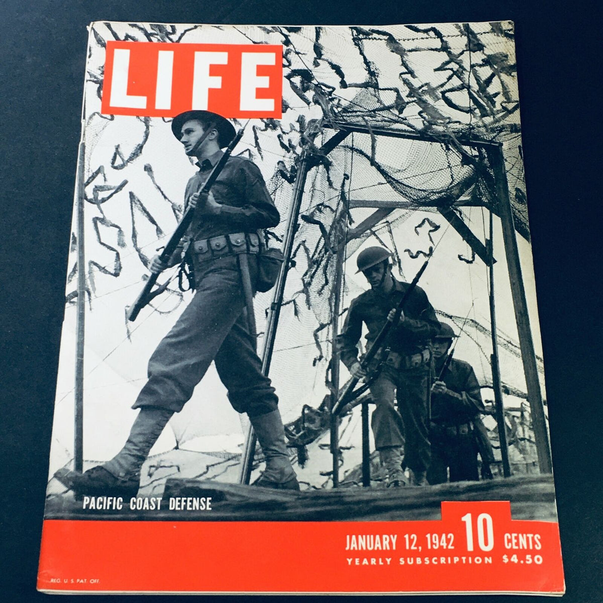 Cover of VTG Life Magazine January 12 1942 featuring soldiers on Pacific Coast Defense, showcasing their military gear and a historic photo from World War II.
