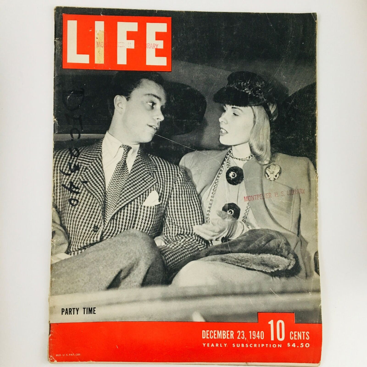 Cover of VTG Life Magazine December 23 1940 featuring a couple dressed for a party, showcasing vintage fashion and holiday-themed imagery.