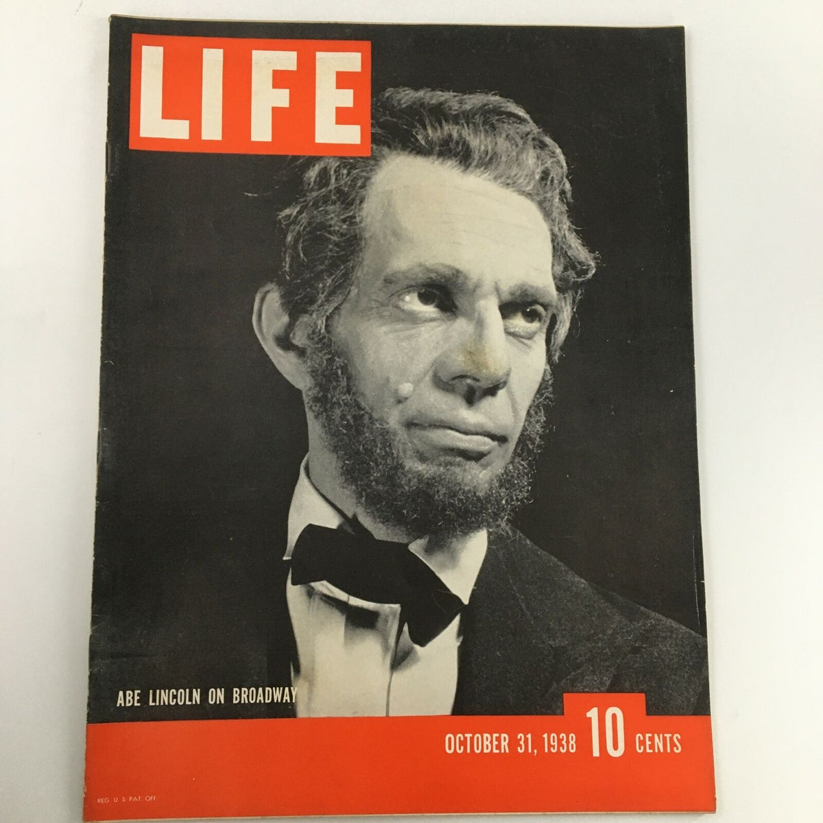 Vintage Life Magazine cover from October 31, 1938 featuring Abraham 'Abe' Lincoln on Broadway. This iconic magazine reflects American culture and history, showcasing the significance of its era.