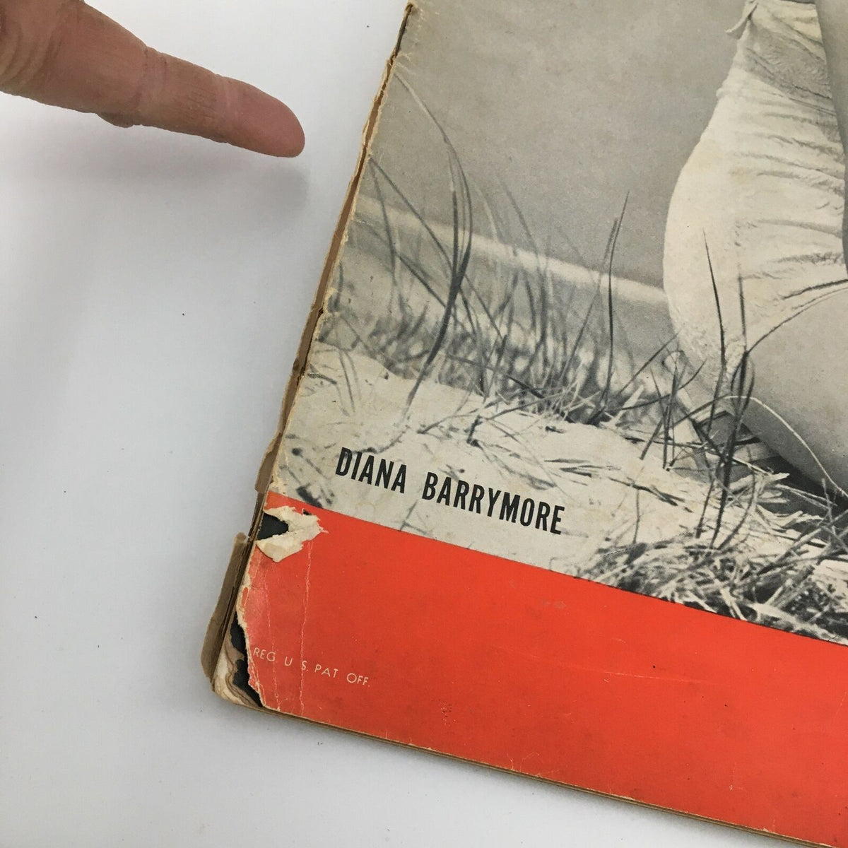 Detailed view of the bottom corner of the Vintage Life Magazine featuring Diana Barrymore, showing the magazine's title and wear on the cover.