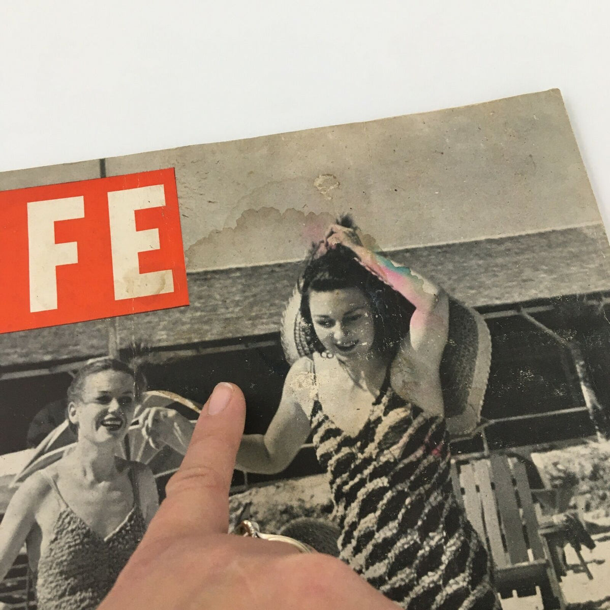 Close-up view of the vintage VTG Life Magazine from February 27, 1939, displaying Cruise Girls at Paradise Beach, highlighting women in swimwear and details from the cover.