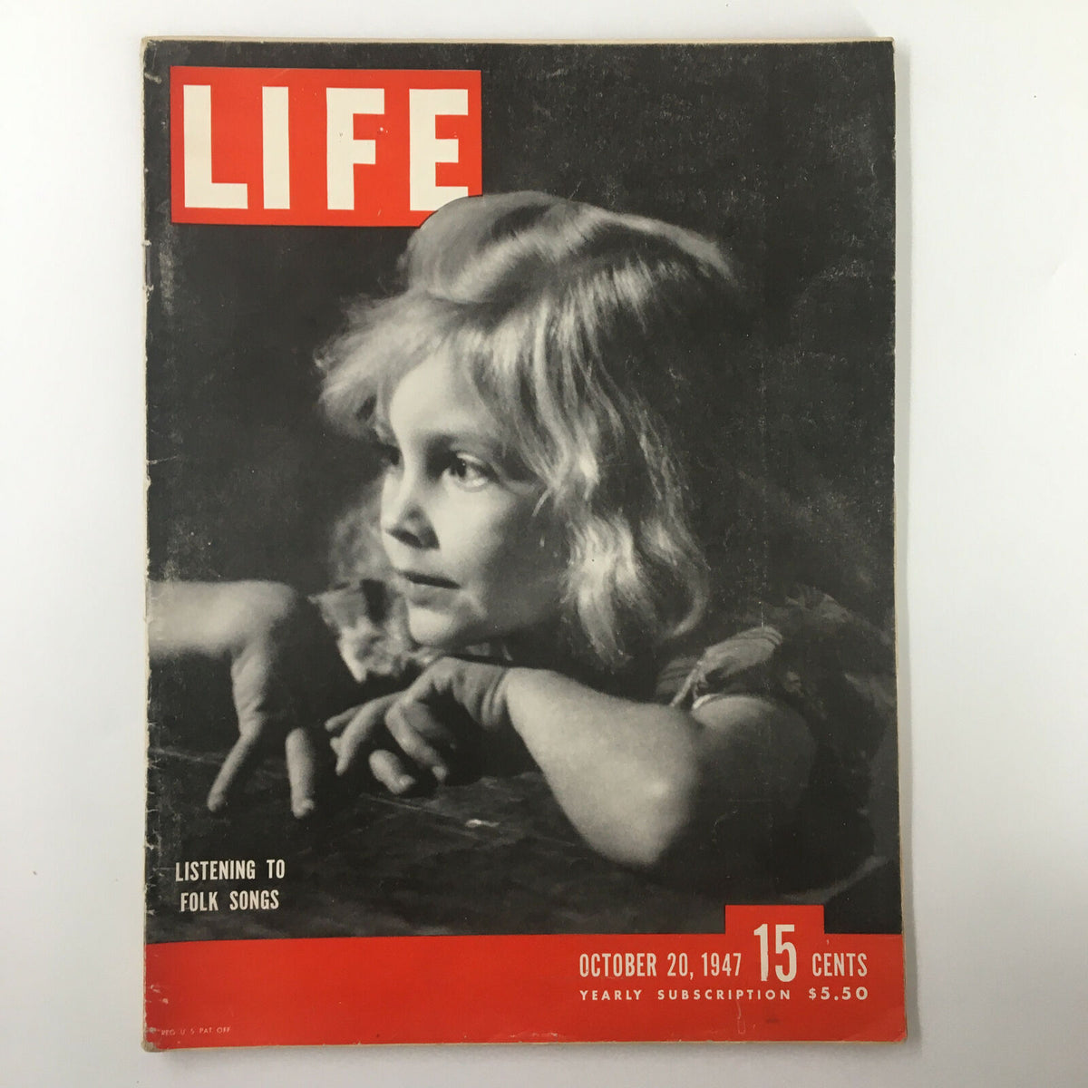 Cover of VTG Life Magazine from October 20, 1947, featuring a portrait of a young girl with blonde hair, evoking themes of folk songs and mid-20th century Americana.