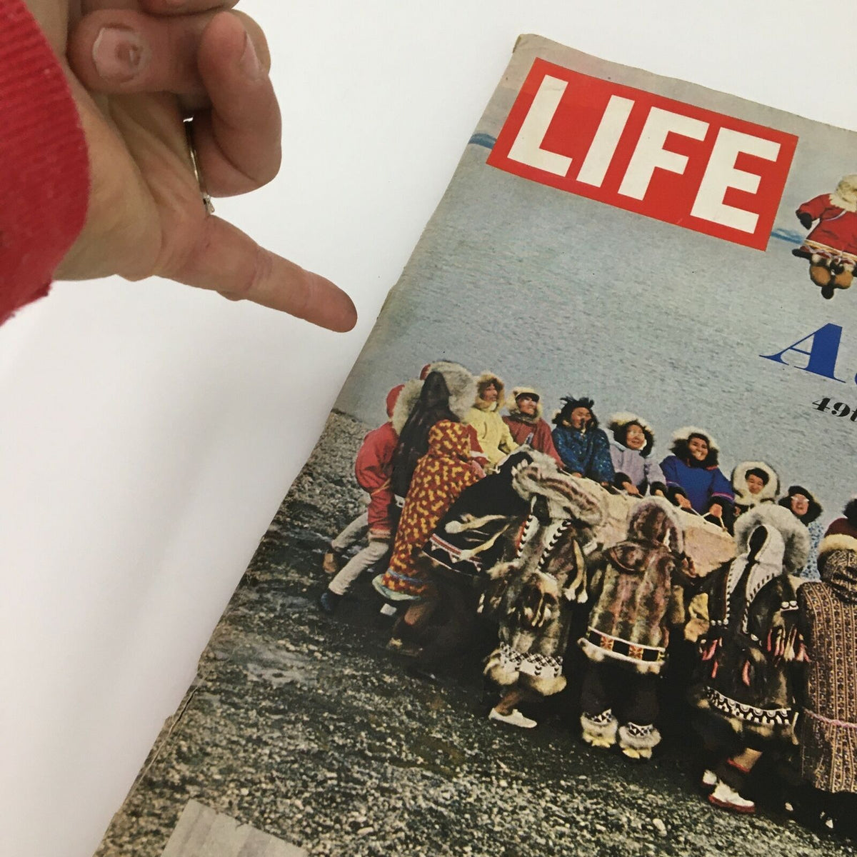 Side view of the VTG Life Magazine October 1 1965 showing the title 'Alaska 49th State'. The image presents a diverse group of people in traditional clothing, showcasing the cultural richness of Alaska.
