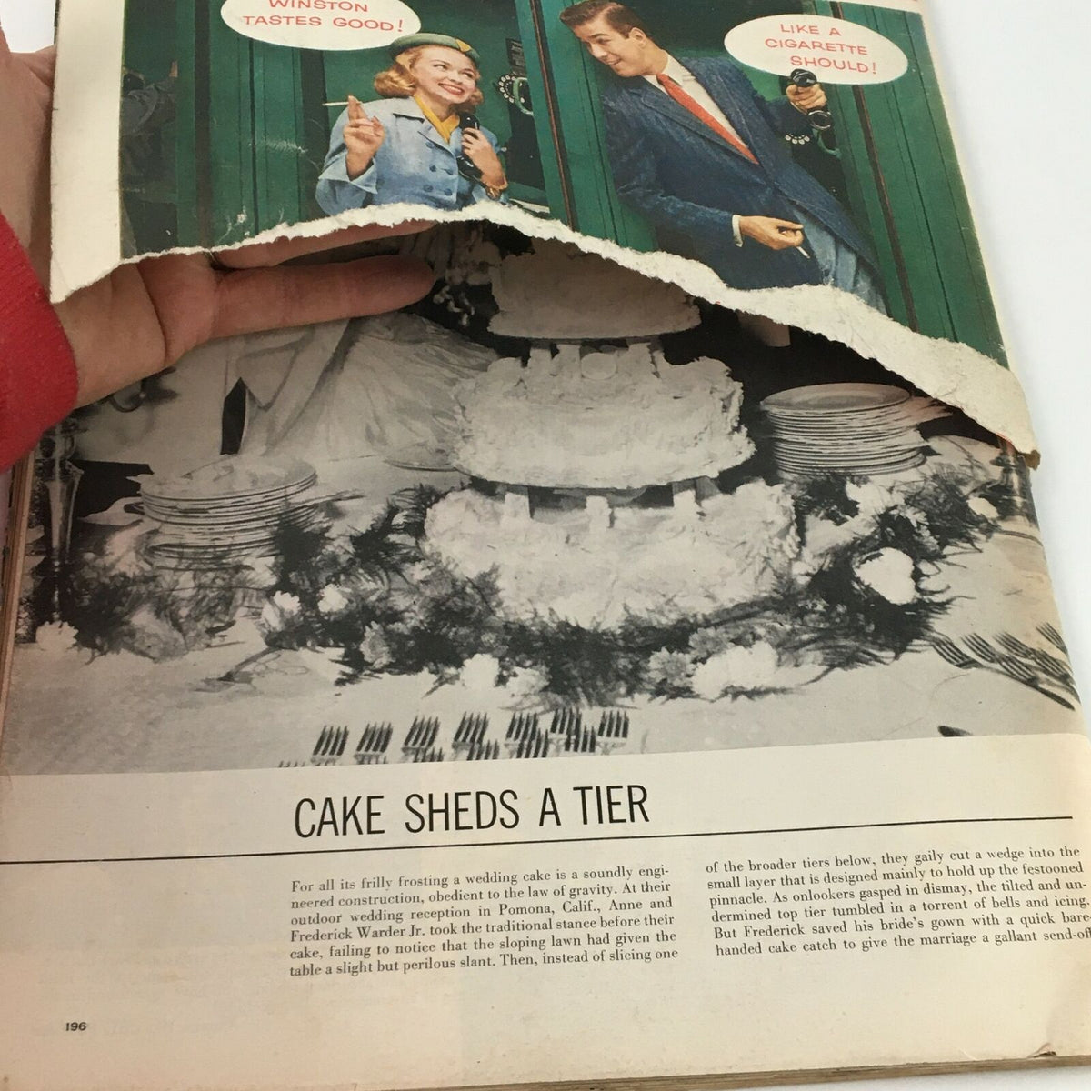 Interior page of VTG Life Magazine from November 26, 1956, showing an article titled 'Cake Sheds a Tier' with a black and white image of a wedding cake.