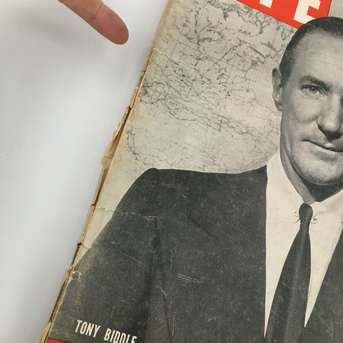 Close-up of the VTG Life Magazine cover from October 4, 1943, highlighting the name Tony Biddle prominently. The magazine's edges exhibit minor wear, showcasing its vintage charm.
