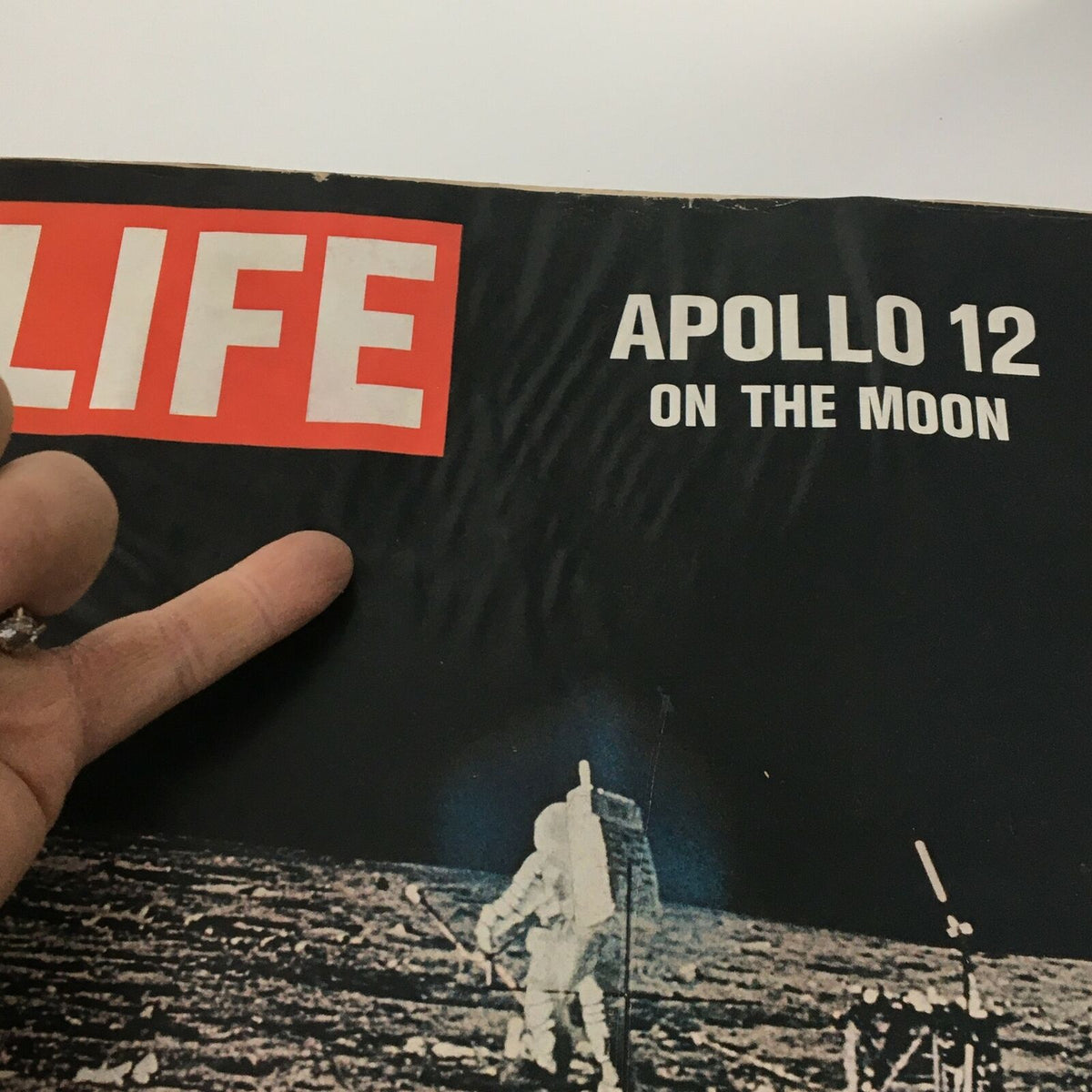 Close-up view of the Vintage Life Magazine cover from December 12, 1969, showcasing Apollo 12 on the Moon. The cover emphasizes the magazine's significant moment in space exploration history.