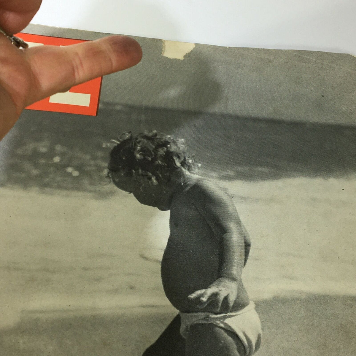 Close-up view of the VTG Life Magazine July 30 1945 Playing with Shadows Cover, emphasizing minor wear and its unique vintage character, ideal for collectors.
