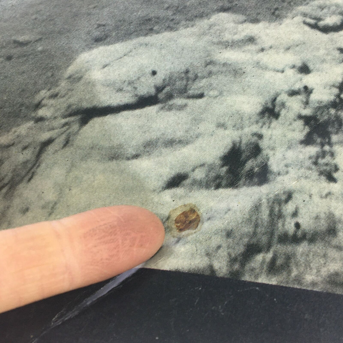 Detailed view of the lunar surface from the VTG Life Magazine July 1, 1966 cover showing a finger pointing to a feature, with the title 'The True Color of the Moon' visible.