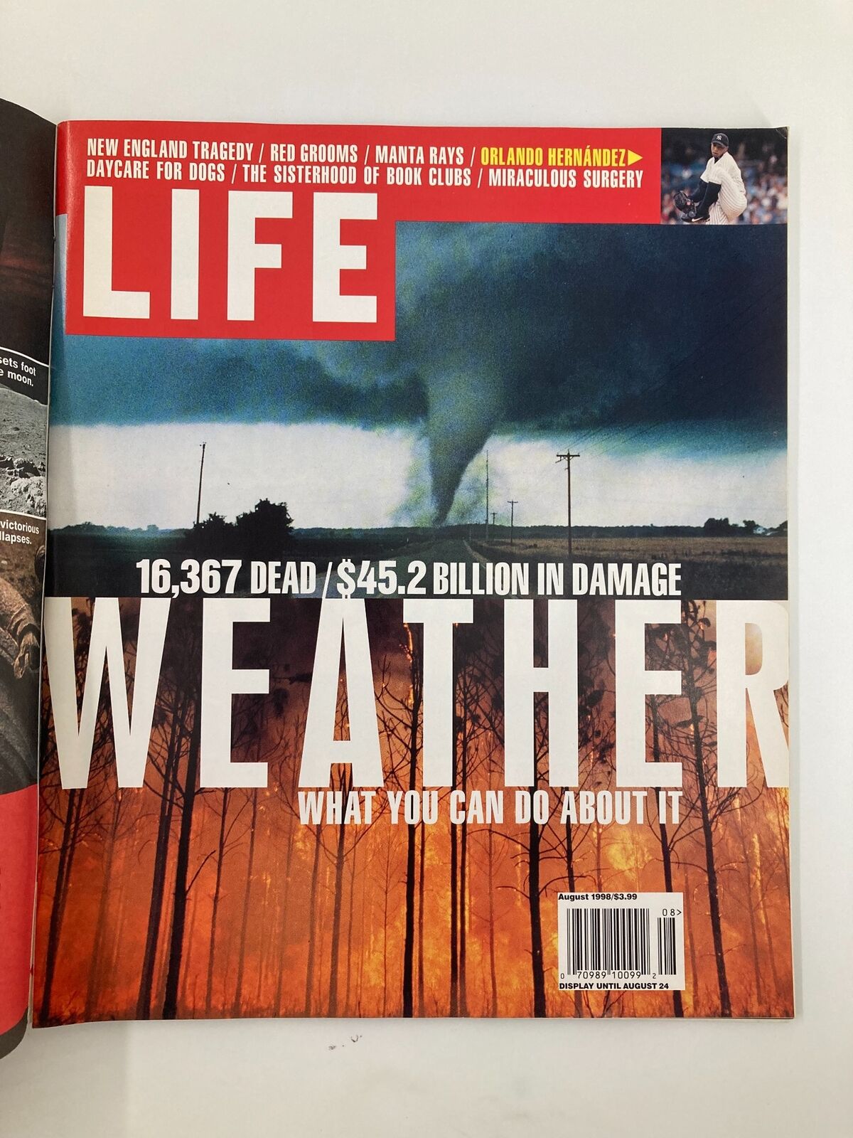Cover of Life Magazine, August 1998 edition titled 'Weather, What You Can Do About It'. The cover features a dramatic image of a tornado with fiery backgrounds highlighting weather-related disasters and statistics on damage.