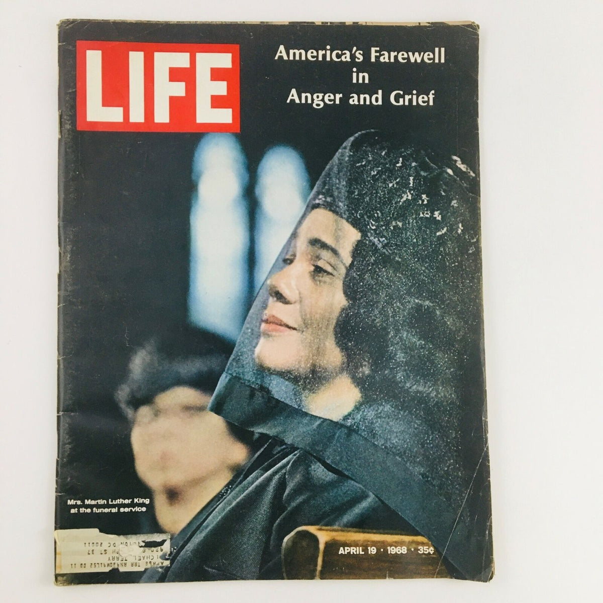 Cover of the vintage Life Magazine from April 19, 1968, featuring Mrs. Martin Luther King Jr. at the funeral service, highlighting America's farewell in anger and grief.