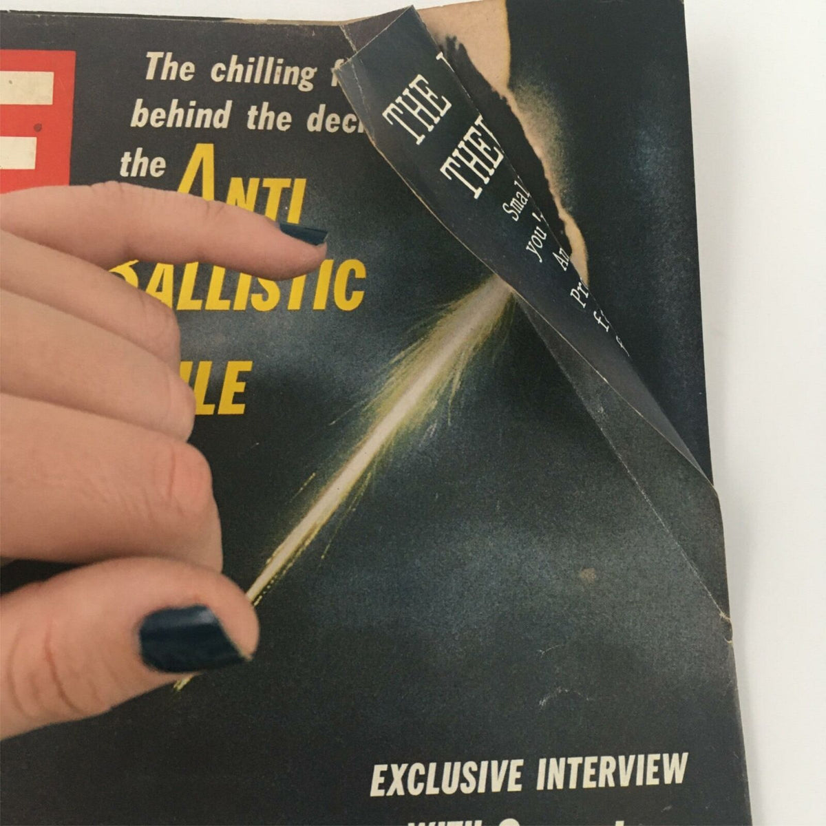 Detail showing the corner of the vintage Life Magazine from September 29, 1967, with visible wear and the cover featuring the title about the Anti Ballistic Missile.
