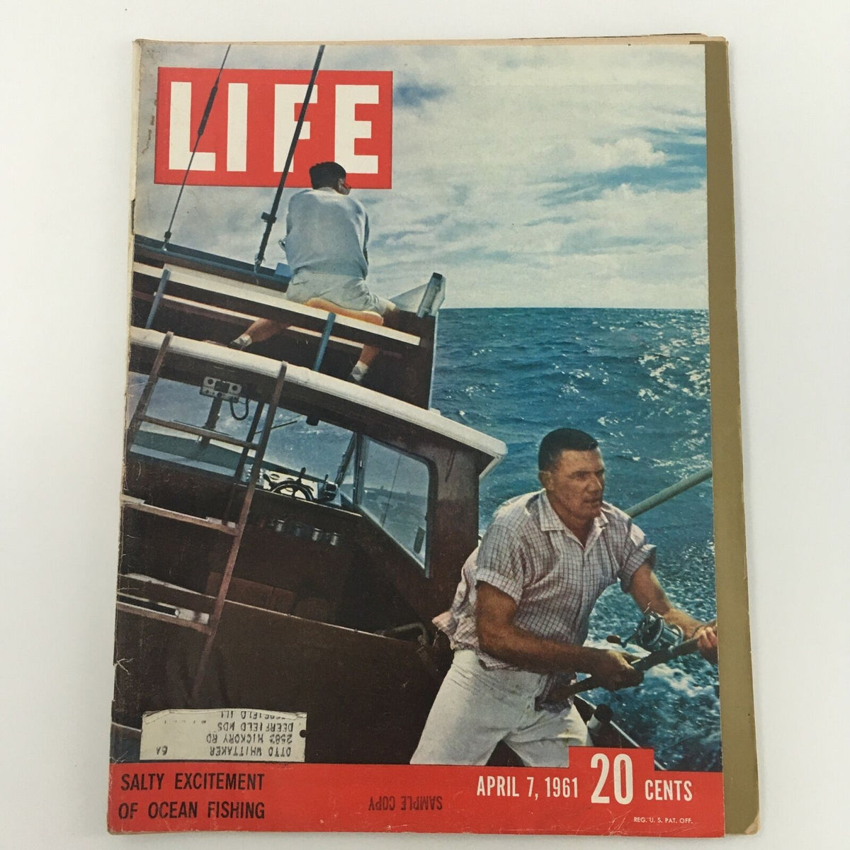 Cover of VTG Life Magazine from April 7, 1961, featuring the salty excitement of ocean fishing, showcasing two fishermen on a boat against a vibrant ocean backdrop.