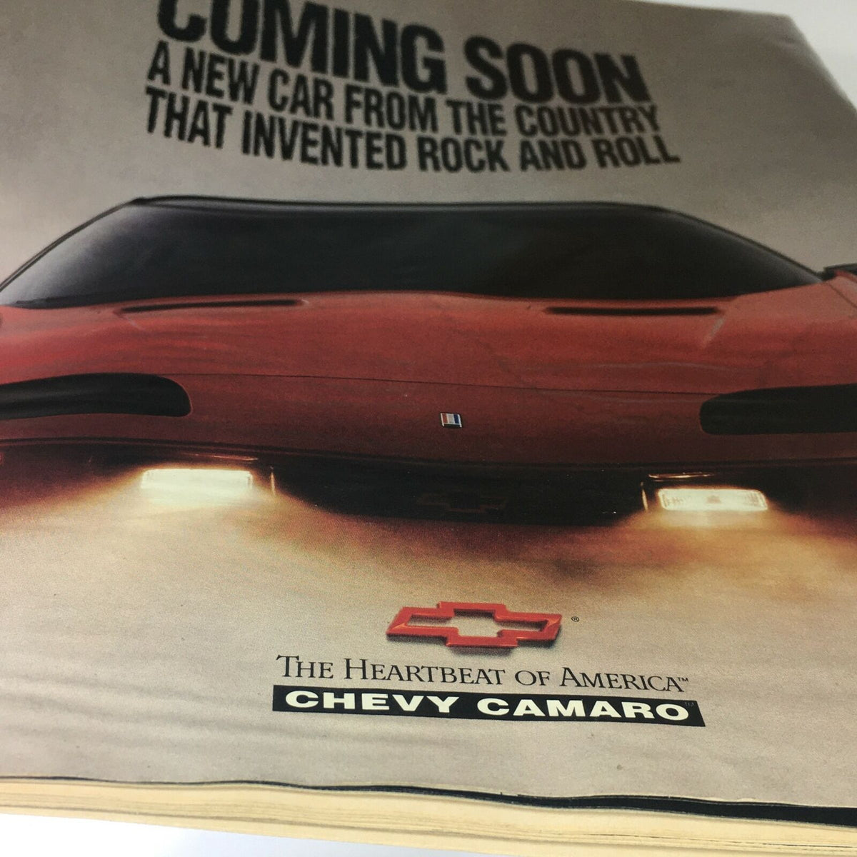 Close-up of the Chevy Camaro advertisement in the VTG Life Magazine December 1, 1992, highlighting its tagline 'The Heartbeat of America'.