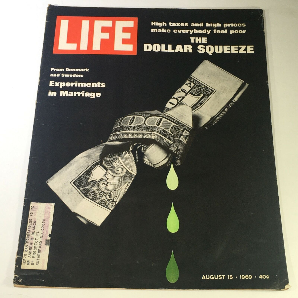 Cover of VTG Life Magazine from August 15, 1969 featuring 'Experiments in Marriage' from Denmark and Sweden, with an artistic depiction of tied dollar bills and green droplets.