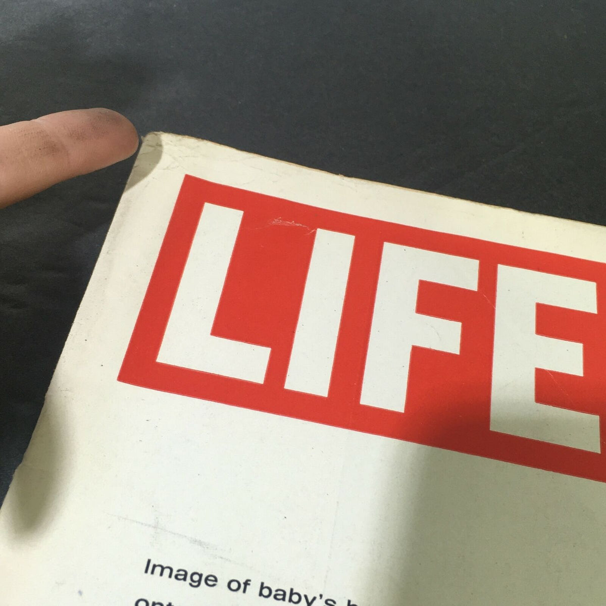 Close-up of the cover of VTG Life Magazine September 10 1965 showing the title 'LIFE' with minor wear indicating its vintage condition.