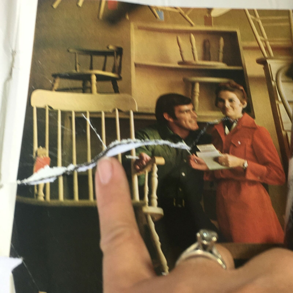 Inside the vintage Life Magazine dated July 31, 1970, featuring a man and woman discussing an advertisement, showcasing the magazine's retro charm.