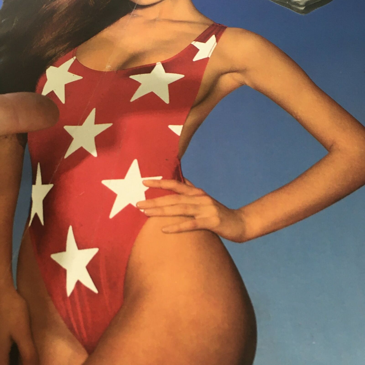 Cover image from VTG Life Magazine February 1986 featuring a model in a red swimsuit with white stars, symbolizing 1980s fashion and culture.