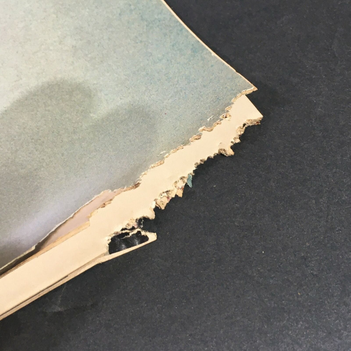 Close-up view of the damage on the edge of the pages from VTG Life Magazine January 31, 1969, highlighting the wear and imperfections of this vintage publication.