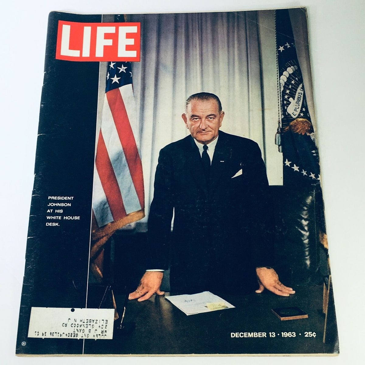 Vintage Life Magazine December 13, 1963 featuring President Lyndon Johnson at The White House. The cover depicts Johnson standing confidently at his desk, with American flags in the background, highlighting a significant moment in American history.