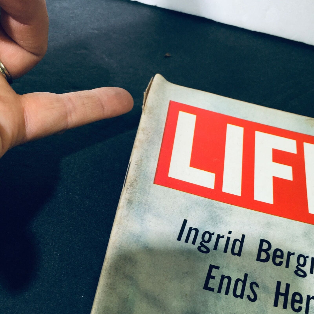 Close-up view of the spine and cover of VTG Life Magazine October 13 1967 showcasing Ingrid Bergman Ends Her Exile, highlighting the magazine's vintage details.