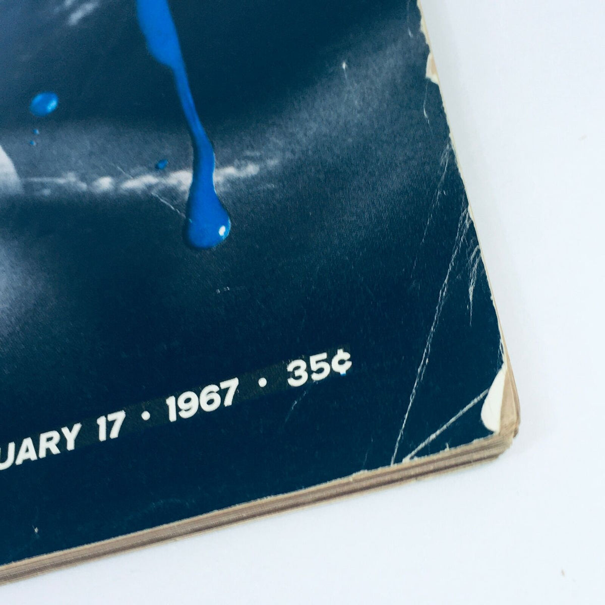 Close-up of the cover of Vintage Life Magazine from February 17, 1967, featuring Ed Sanders. The image highlights the publication date and price, showcasing the magazine's historical significance.