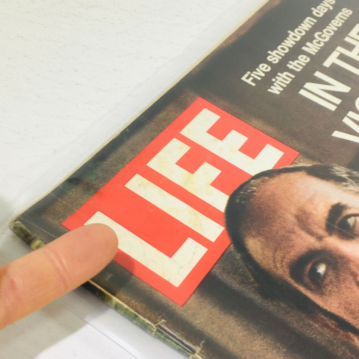 Close-up view of the title 'LIFE' on the cover of the vintage magazine from July 21, 1972, featuring an article titled 'In The Victory Suite'.