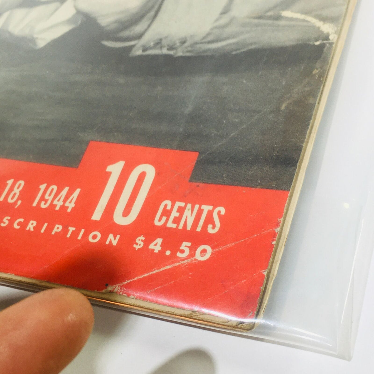 Close-up of the vintage Life Magazine dated December 18, 1944, highlighting the price tag of 10 cents and subscription details. Cover features Major Jopolo from 'A Bell For Adano.'