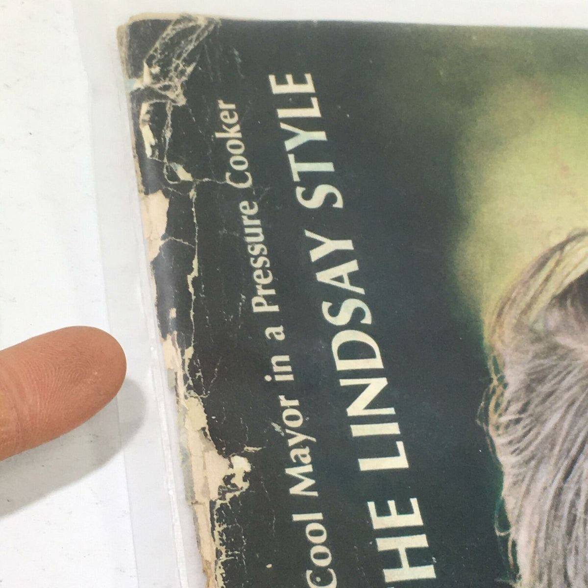 Close-up view of the vintage Life Magazine from May 24, 1968, illustrating the aging edges and scratches while emphasizing the captivating headline about John Vliet Lindsay.