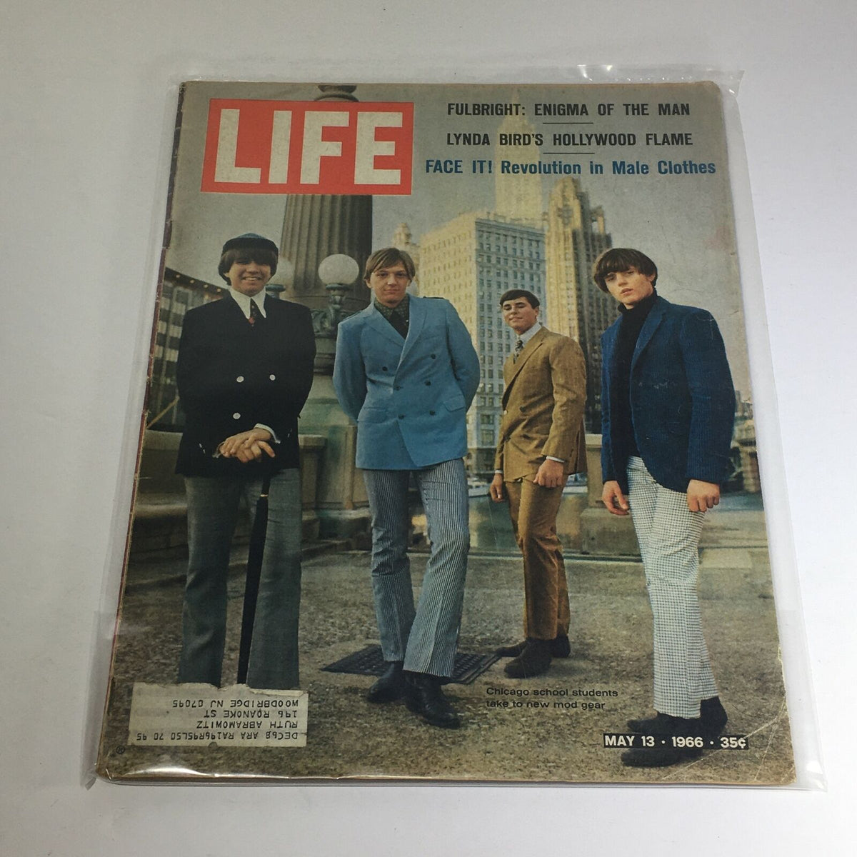 Cover of VTG Life Magazine May 13 1966 featuring a photo of four elegantly dressed men in a city setting, highlighting the themes of Lynda Bird's Hollywood Flame and Enigma of the Man.