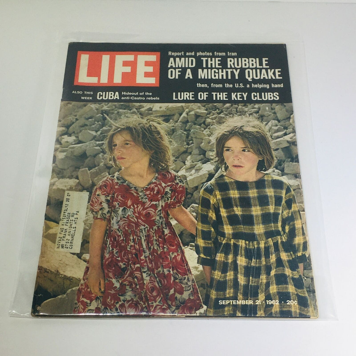 Cover of VTG Life Magazine dated September 21, 1962, featuring two young girls amidst rubble from a mighty earthquake, showcasing themes of resilience and the emergence of Key Clubs.