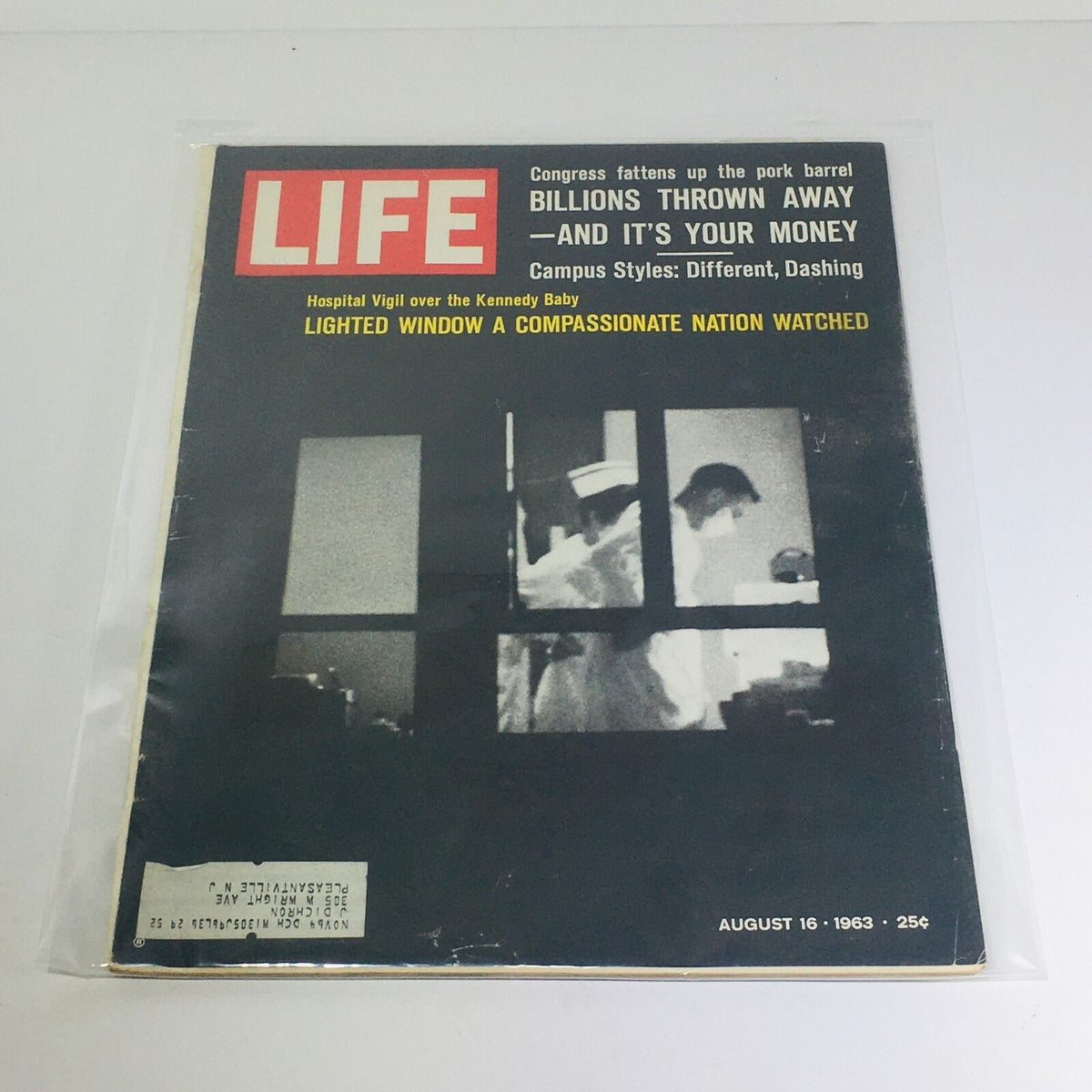 Cover of VTG Life Magazine from August 16, 1963, featuring the headline 'Billions Thrown Away - And It's Your Money'. The magazine showcases a photograph of hospital staff and discusses economic issues, preserved in protective covering.