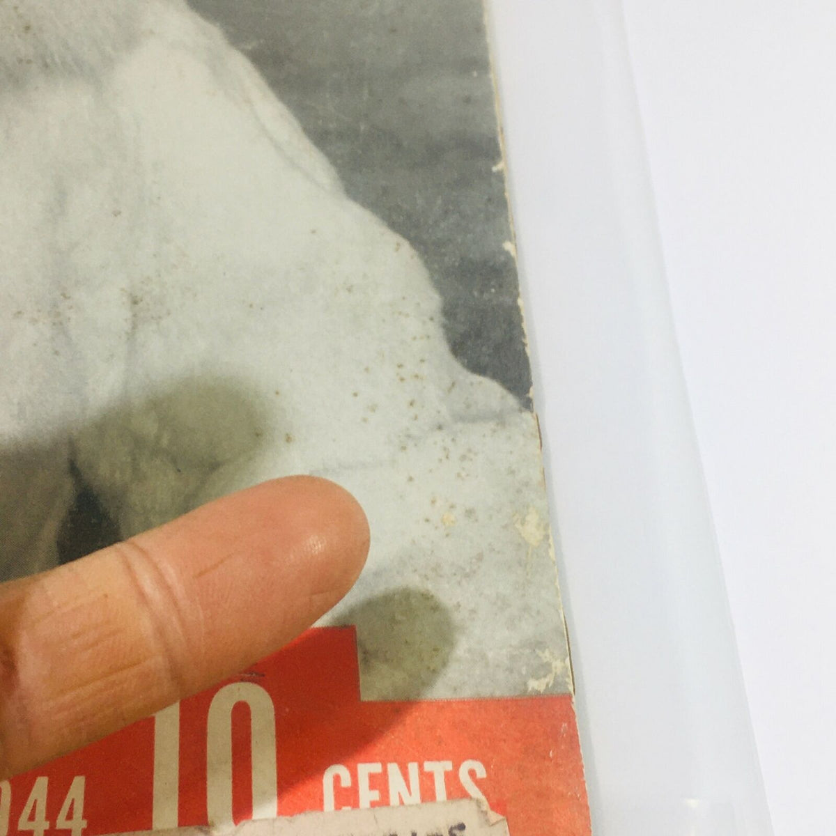 Close-up view of the VTG Life Magazines: January 3 1944 - Alaska Holiday / New Guinea Rescue cover, highlighting the magazine's price and address label, reflecting its vintage condition.