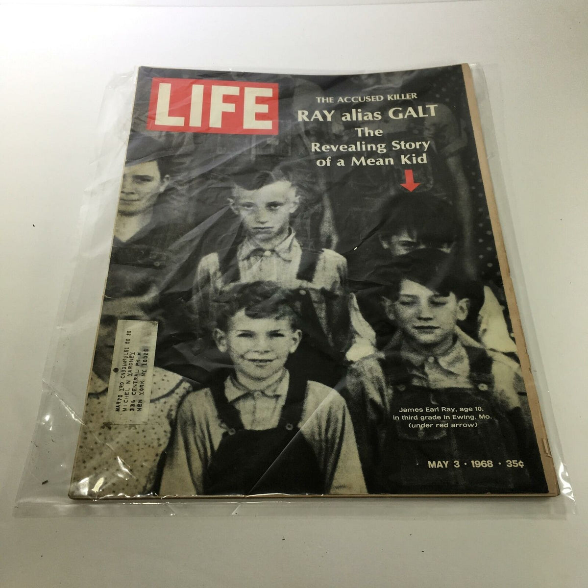 Vintage Life Magazine cover from May 3, 1968, featuring the title 'The Accused Killer: Ray aka Galt' and an image of James Earl Ray at age 10, along with other children. This collectible magazine provides a revealing story about a notable case.