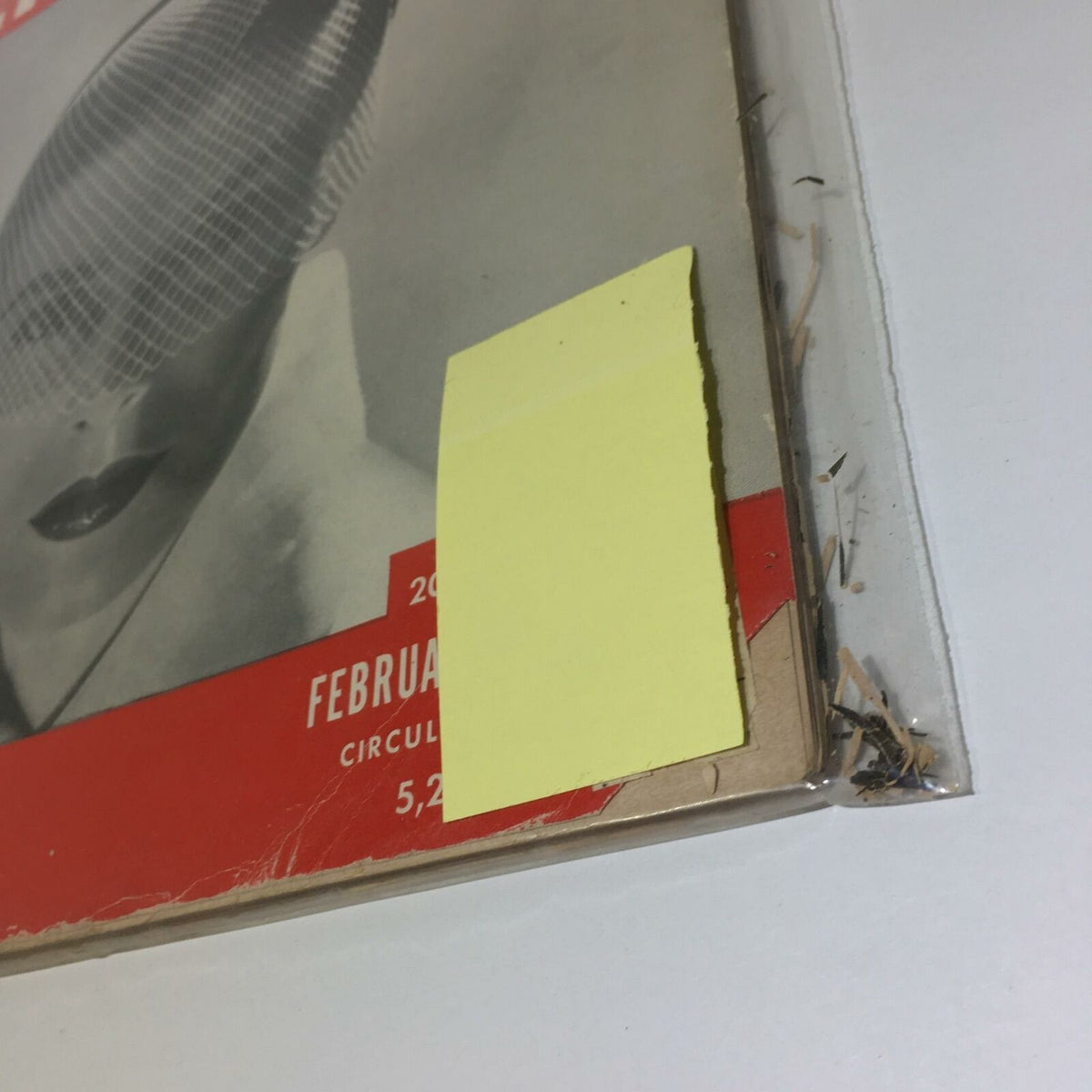 Close-up view of the February 12, 1951 issue of Life Magazine featuring the Veil Hats Passion Full Cover, showcasing the magazine's edge and protective plastic wrap.