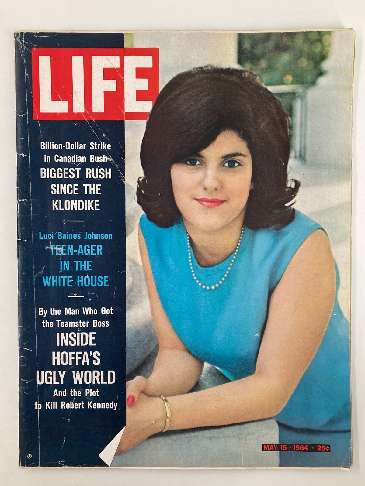Cover of VTG Life Magazine from May 15, 1964 featuring Luci Baines Johnson, highlighting her presence in the White House with vibrant colors and retro design.