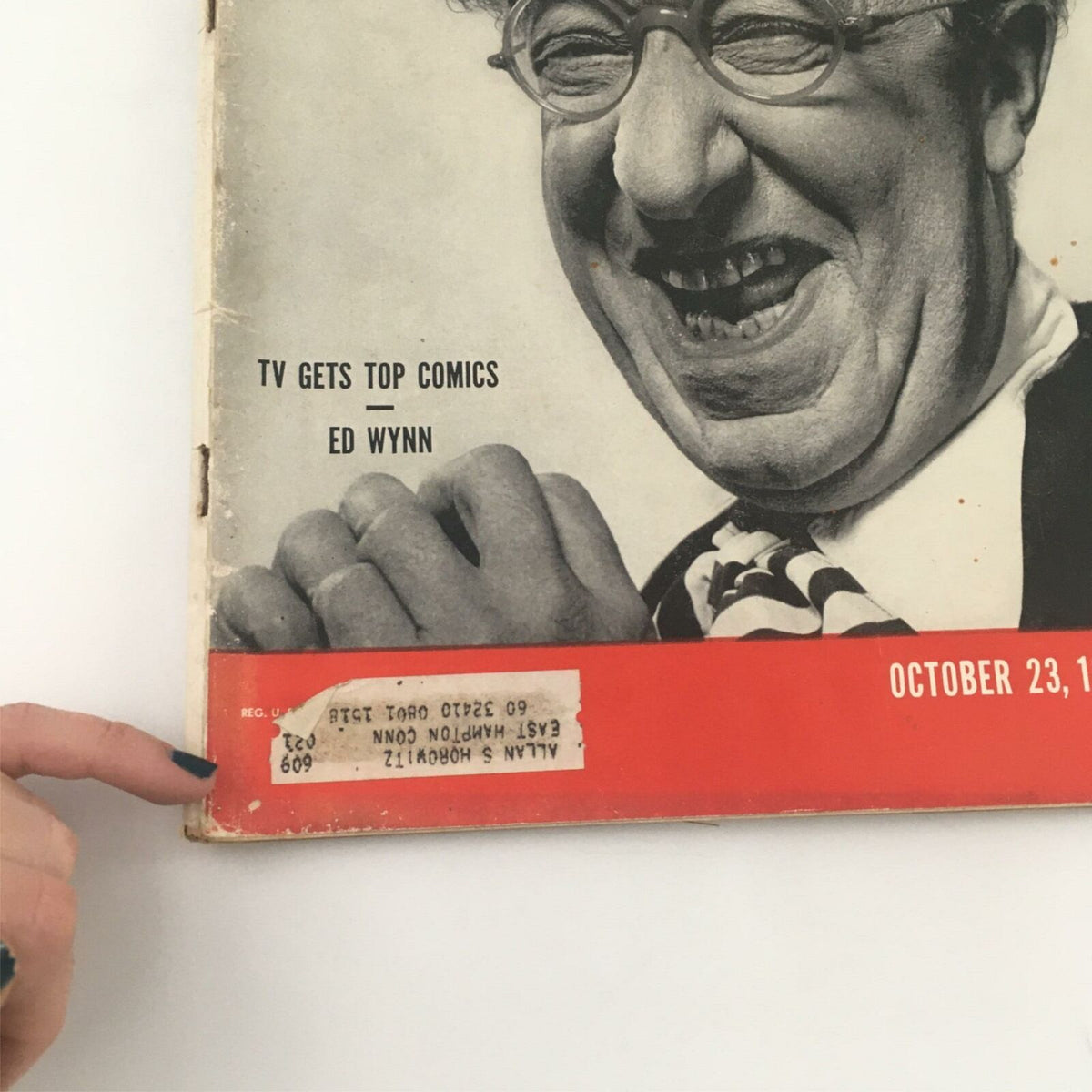 Close-up of VTG Life Magazine October 23, 1950, showcasing the cover with Ed Wynn and the address label. Highlights include the magazine's theme 'TV Gets Top Comics' and an insight into Churchill's memoirs.