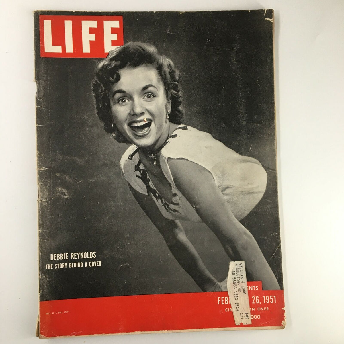VTG Life Magazine cover from February 26, 1951 featuring Debbie Reynolds, showcasing her joyful expression and vintage style, with the title prominently displayed.