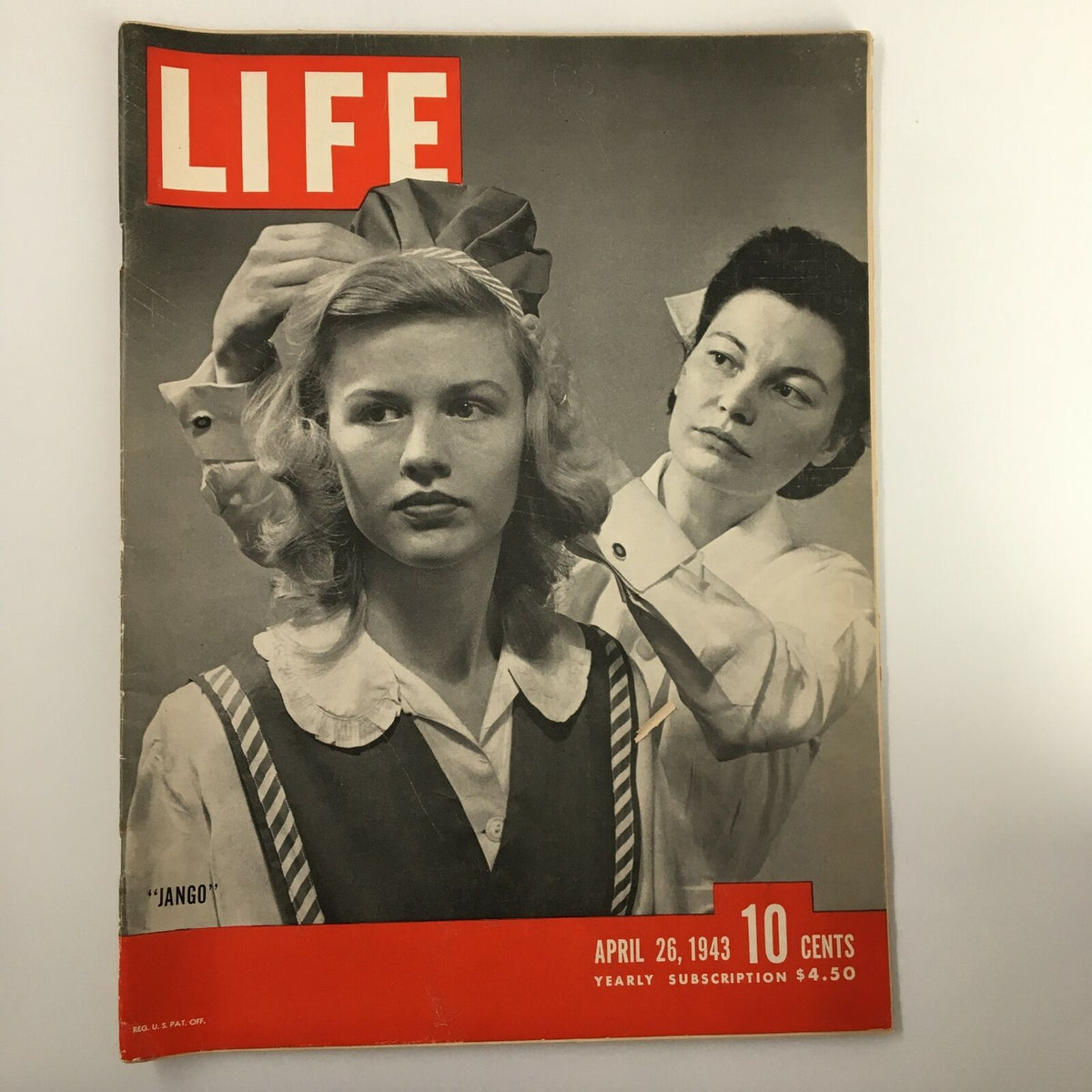 Cover of VTG Life Magazine April 26 1943 featuring the story of Jango Junior's Nursing Aides, showcasing two women, one styling hair, emphasizing the cultural and social themes of the early 1940s.