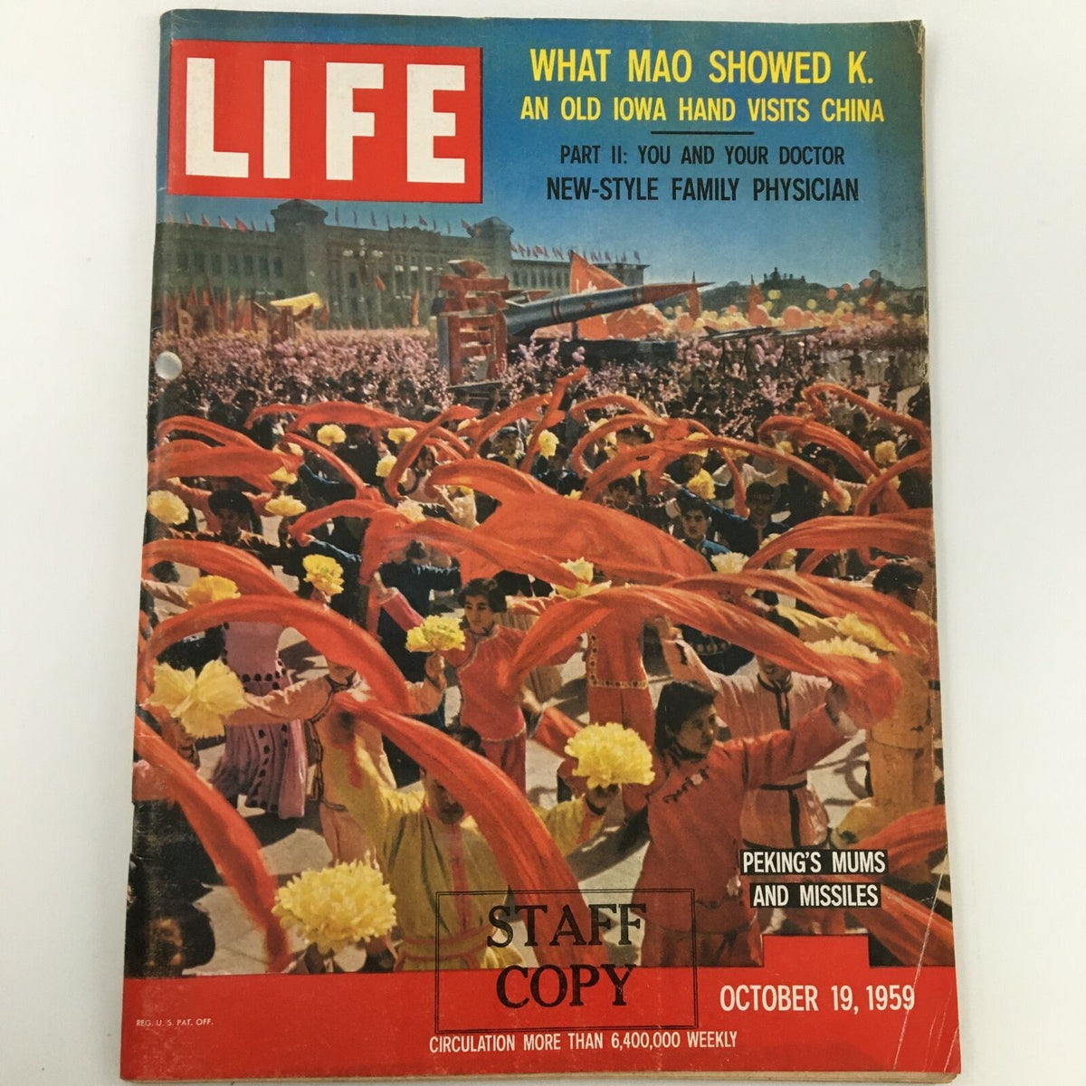 VTG Life Magazine cover from October 19, 1959, titled 'Peking's Mums and Missiles,' featuring a colorful parade scene with performers, showcasing historical cultural context.