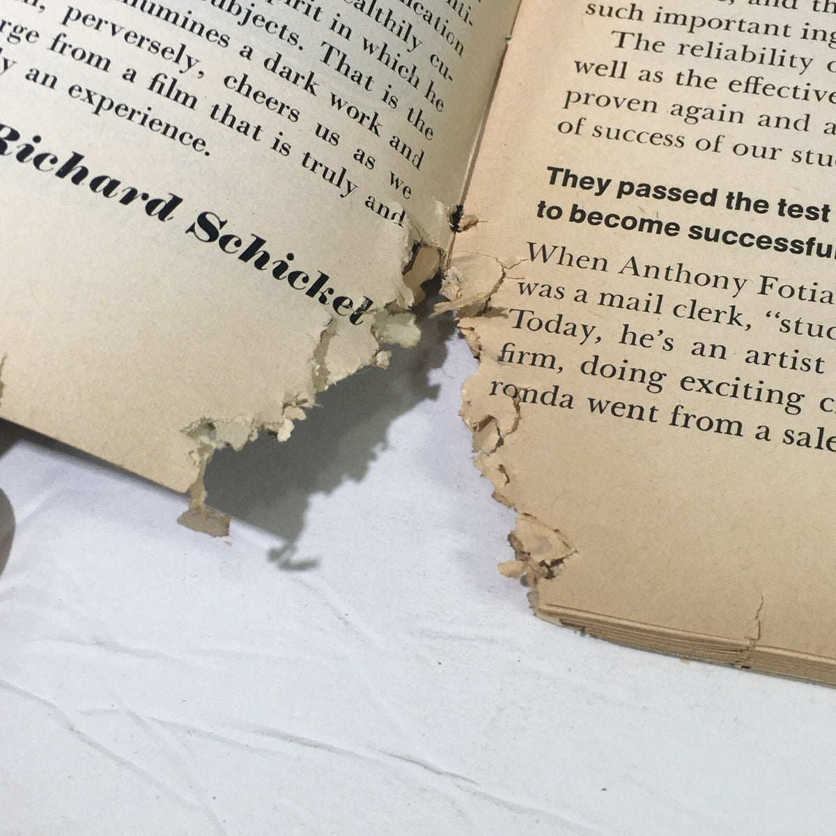 Interior view of a worn page from the vintage Life Magazine January 17, 1969, depicting significant tearing and damage, emphasizing its collectible status related to 'Our Journey To The Moon.'