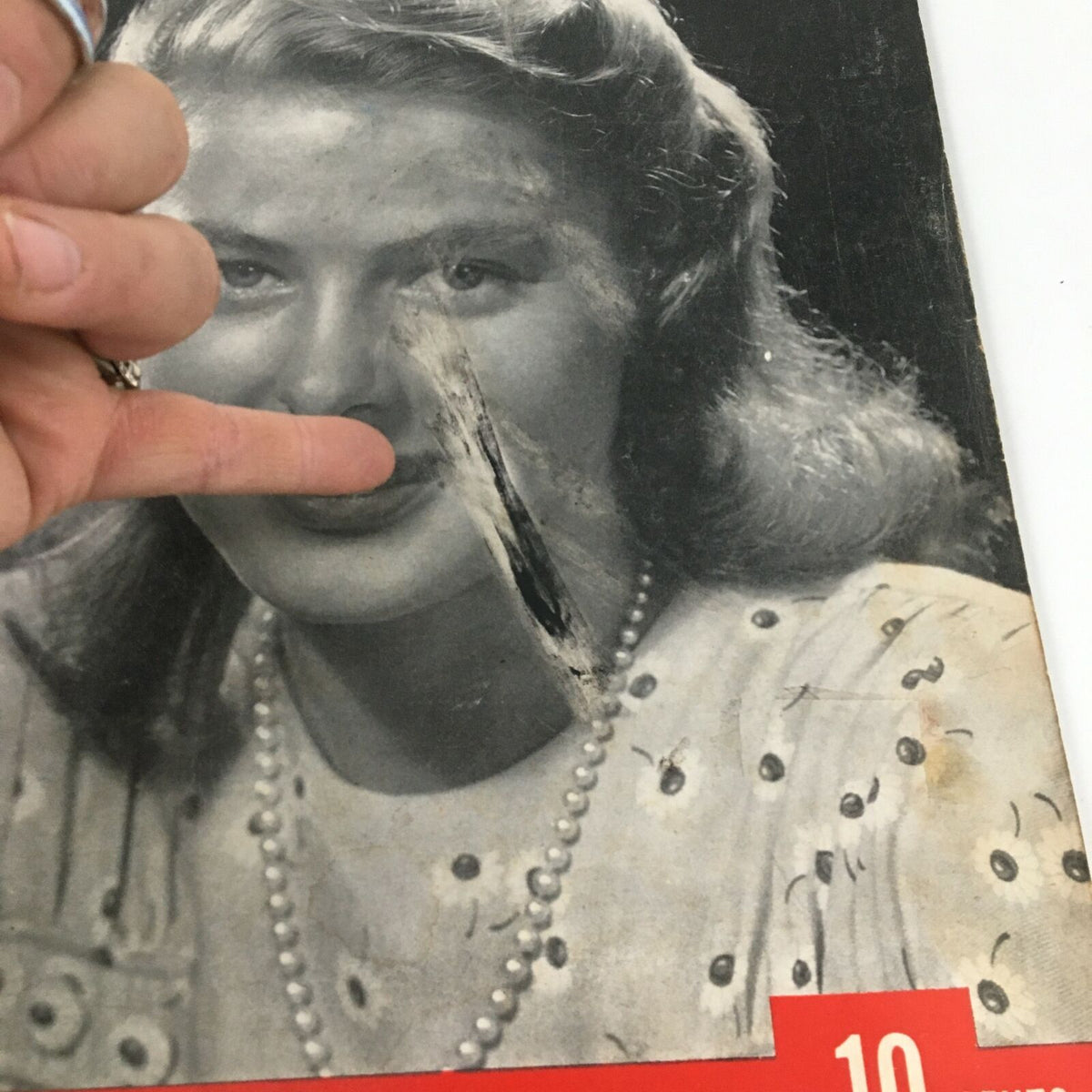 Detailed look at the front cover of the VTG Life Magazine November 12 1945, emphasizing Ingrid Bergman's face and the magazine's condition with visible wear.