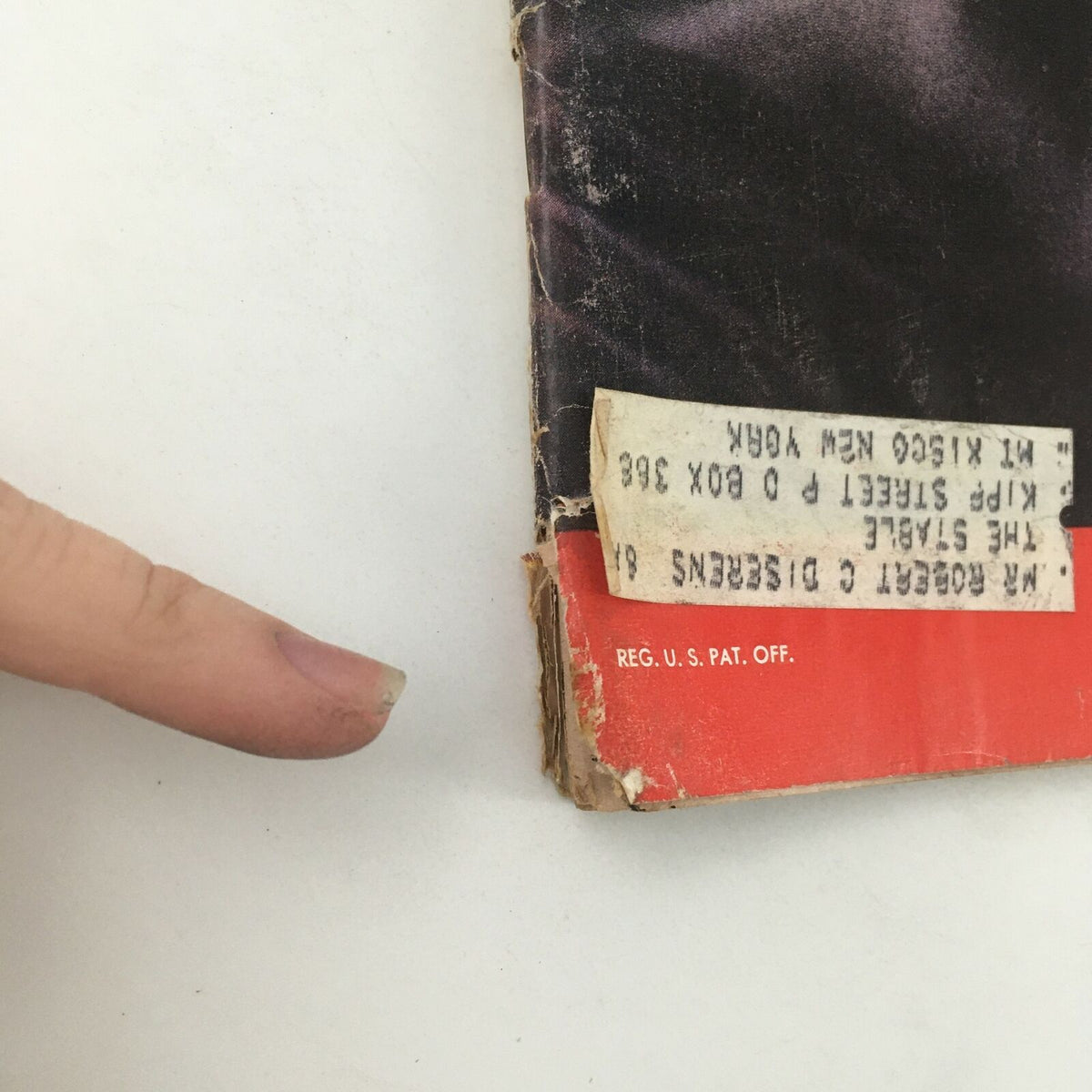 Close-up of the side of the vintage Life Magazine from January 13, 1961, showing a label with address details and signs of wear. This issue features Clark Gable, marking his last film, and reflects the history of early 1960s cinema.