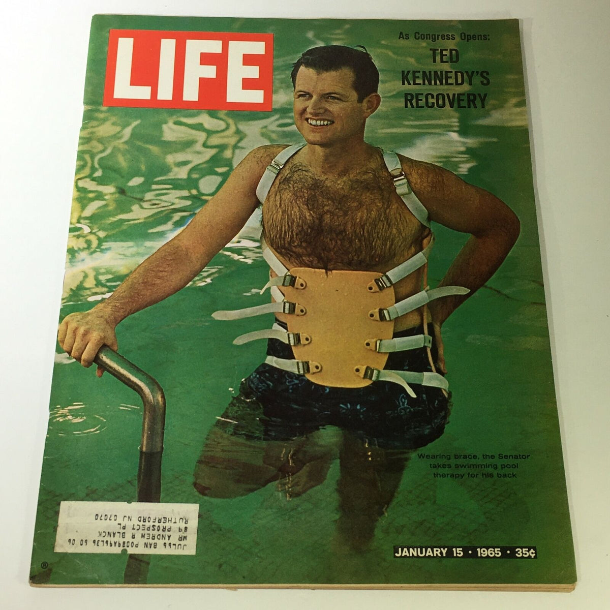 VTG Life Magazine January 15, 1965 cover featuring Ted Kennedy in a therapeutic brace, showcasing his recovery while standing in a swimming pool.