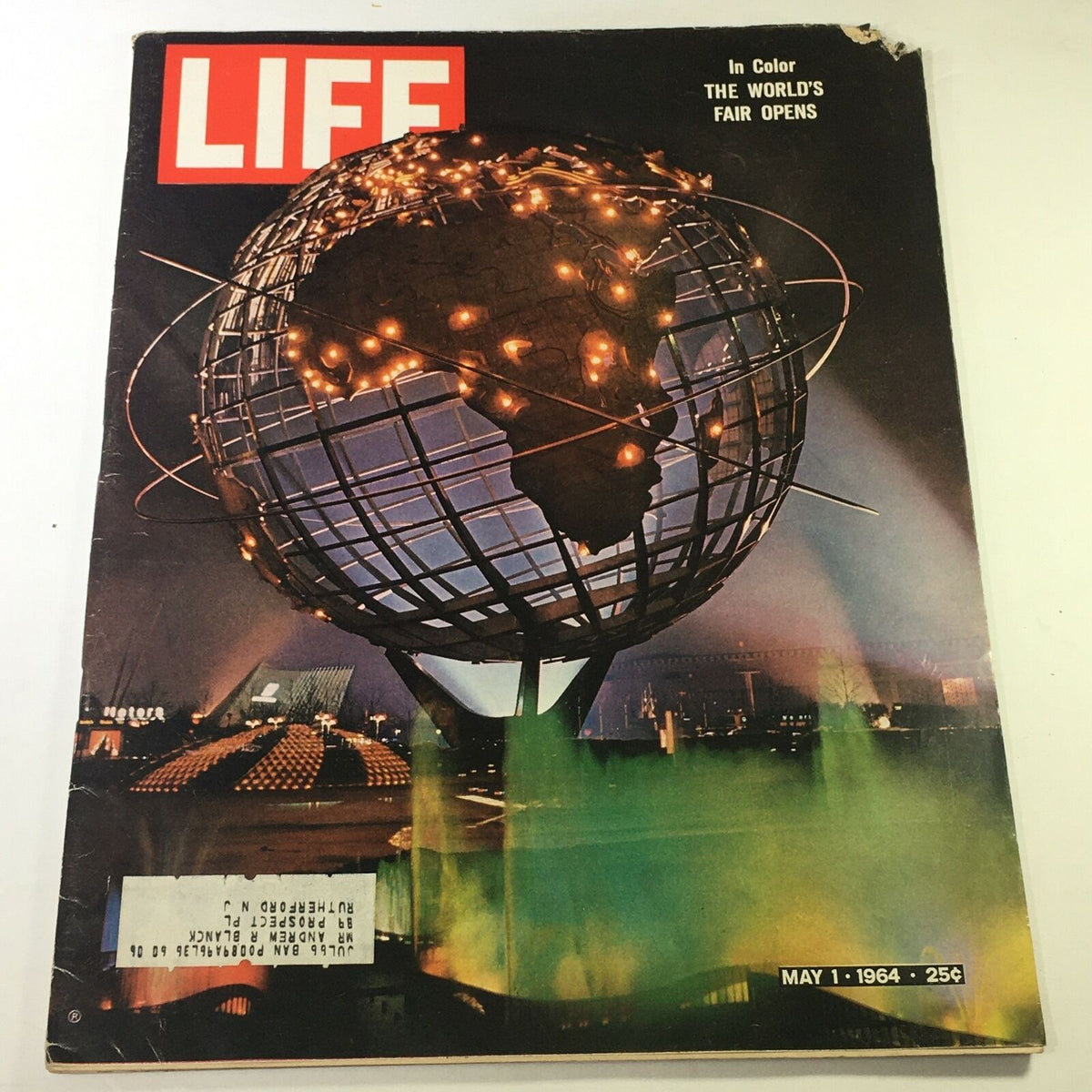 Cover of the VTG Life Magazine from May 1, 1964, featuring the theme 'In Color - The World's Fair Opens', showcasing a globe with lights and a vibrant background.