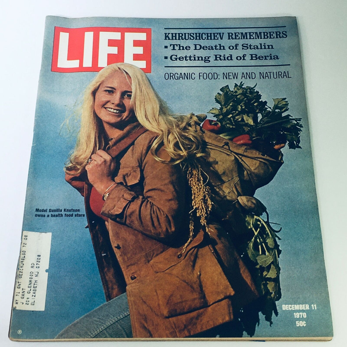 Cover of VTG Life Magazine from December 11, 1970 featuring Gunilla Knutson, who is depicted smiling while holding a bag of organic produce, epitomizing the health food movement.