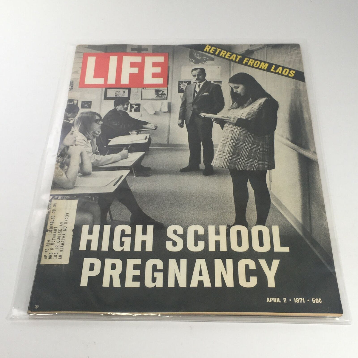 Cover of VTG Life Magazine from April 2, 1971 featuring the headline 'High School Pregnancy' and 'Retreat From Laos,' showcasing a classroom scene.
