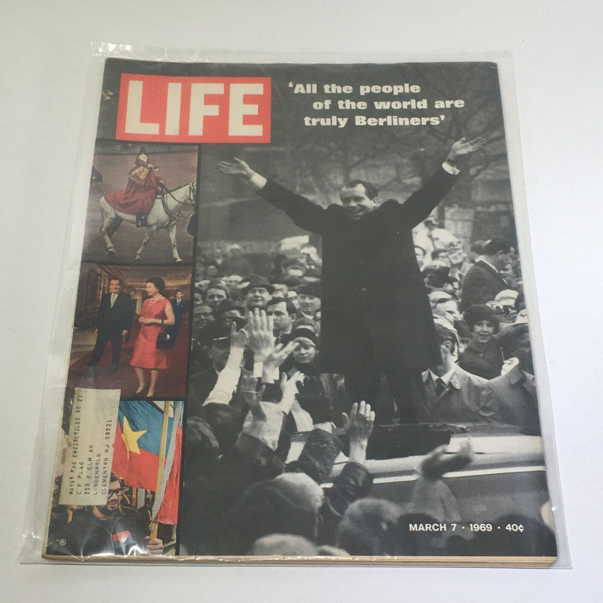 VTG Life Magazine Cover from March 7, 1969 featuring the title 'All the People of the World Are Truly Berliners'. The cover displays an iconic image of a crowd with raised hands and a prominent figure addressing them, symbolizing solidarity and unity during a historic moment.