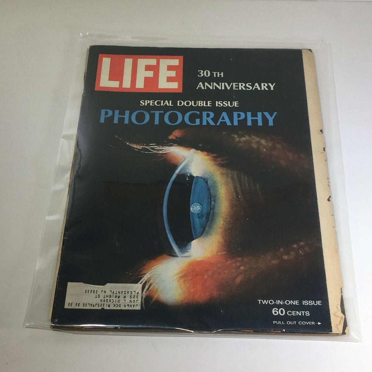 VTG Life Magazine: December 23 1966 - 30th Anniversary Special: Photography cover featuring an artistic eye design and the words 'PHOTOGRAPHY' prominently displayed, encapsulated in a protective plastic cover.